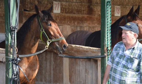 Grinfromeartoear colt rory McIlroy with trainer Willie Fleming
